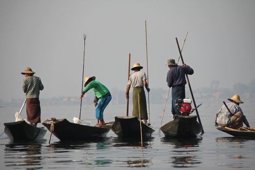 Men fishing on Inle Lake in Myanmar Feb 2015 No model release Editorial use only