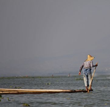A man fishing on Inle Lake in Myanmar Feb 2015 No model release Editorial use only