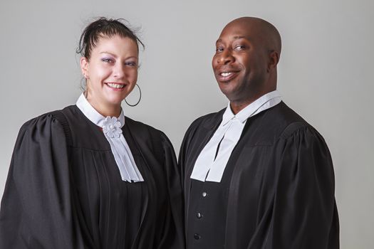 man and woman lawyer happily smilling