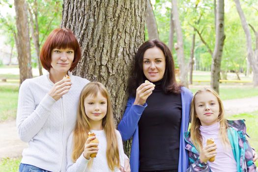 Photo of group people are eating in summer