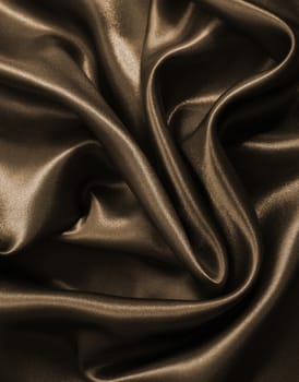 Smooth elegant golden silk or satin can use as background. In Sepia toned. Retro style