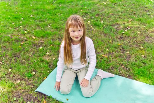 Photo of cute playing girl in summer