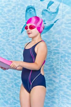Photo of cute girl in swimming pool