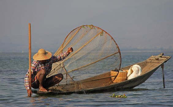 A man fishing on Inle Lake in Myanmar Feb 2015 No model release Editorial use only