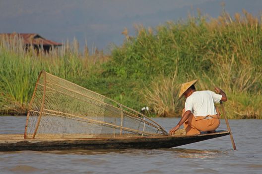 A man fishing on Inle Lake in Myanmar Feb 2015 No model release Editorial use only