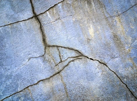 abstract background or texture old plaster split with cracks