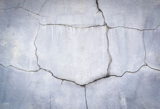 abstract background or texture old plaster split with cracks
