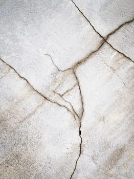 abstract background or texture old plaster split with cracks