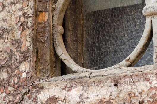 Detail of old window with wooden grate.