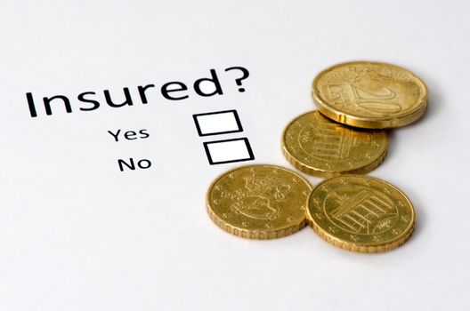 Risk or insurance business concept and euro coins.