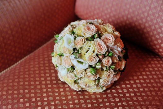 wedding bouquet on sofa.