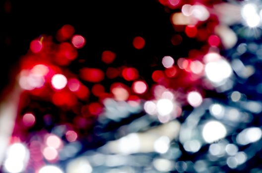 Silver and red blur circles lights as abstract background. 