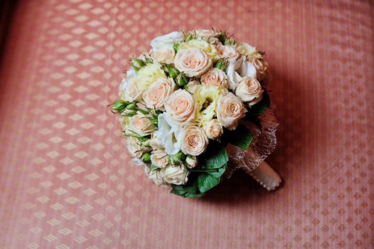 wedding bouquet on sofa.