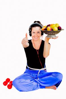 Isolate against white background. Girl shows that she is very happy, healthy and thin from sports and vegetarian food