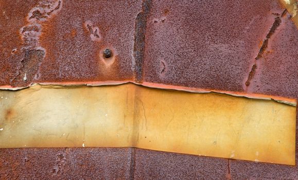 Rusty red yellow sheet of metal plate. 