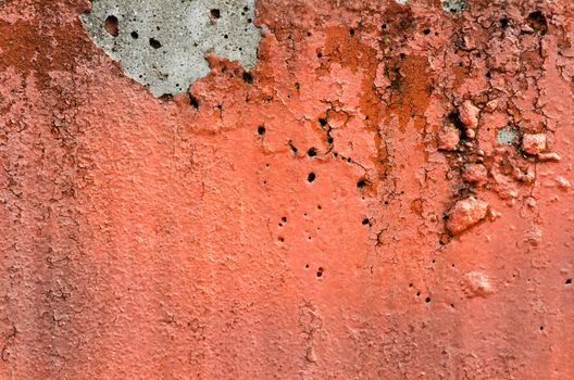 Orange black white painted chappy wall texture background.