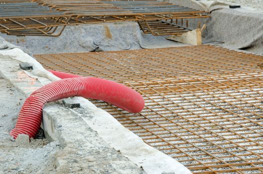 Street repairing, metal bolter and red pipe. 