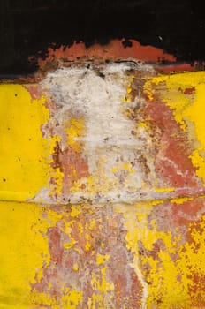 Detail of black yellow rusty metal surface. 