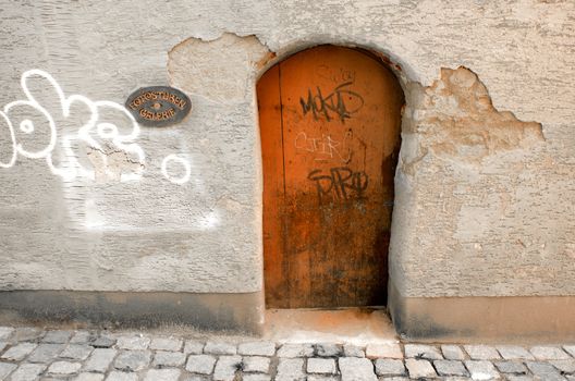 Small orange wooden doors. Peaceful german lane.