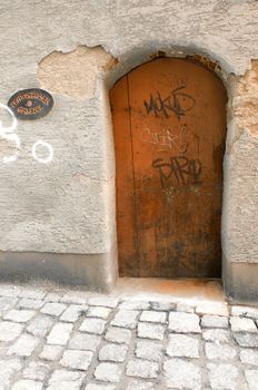 Small orange wooden doors. Peaceful german lane.