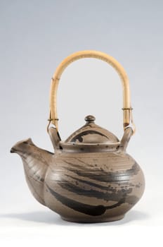 Traditional ceramic brown tea pot, applied art. 