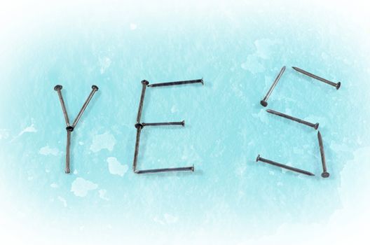 Positive answer yes word isolated on blue background. 