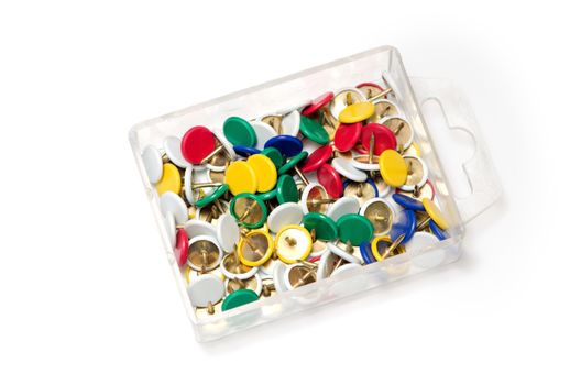 A lot of colorful tumb tack in the plastic box.