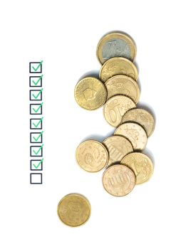 Questionnaire business concept and several euro coins.