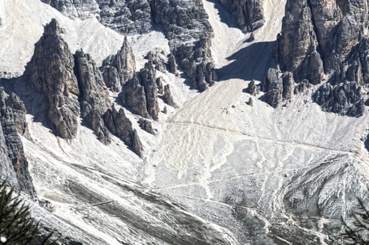 mountain hiking trail among the rocks of the Dolomites