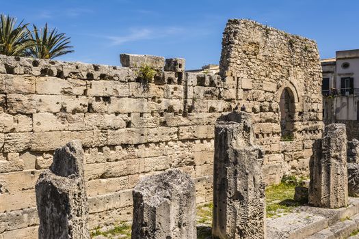 View of the ruins of the ancient greek doric temple of Apollo in Siracusa, Sicilia, Italy