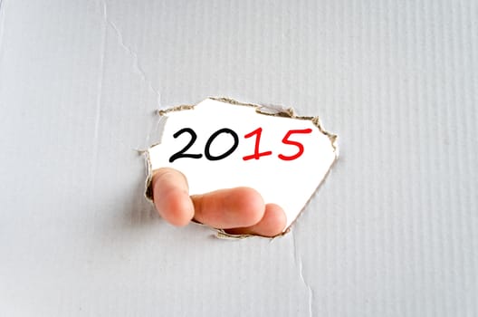 Hand on the cardboard background 2015 concept