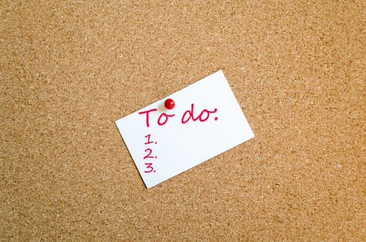 Sticky Note On Cork Board Background To Do Concept