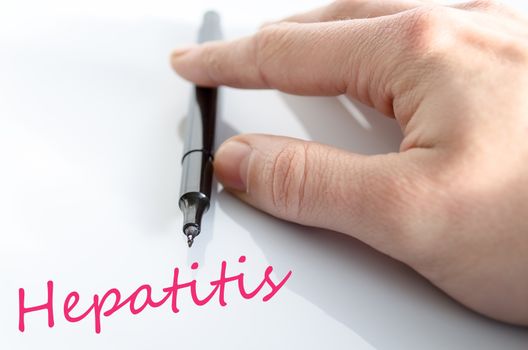 Pen in the hand isolated over white background hepatitis concept