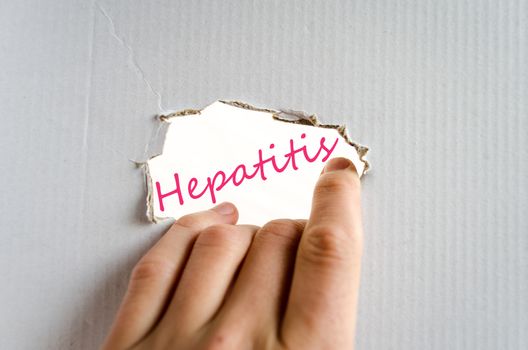Hand on the cardboard background hepatitis concept