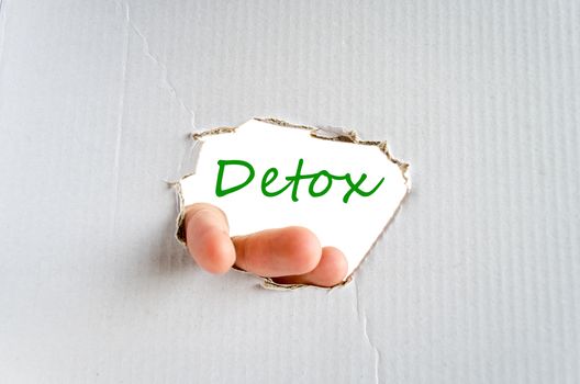 Hand on the cardboard background detox concept