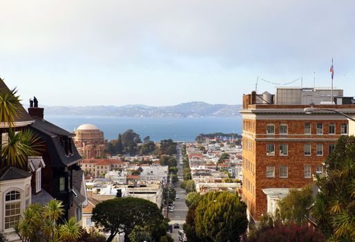 Russian consulate (right). Baker street in San Francisco. View of the bay and Palace Of Fine Arts