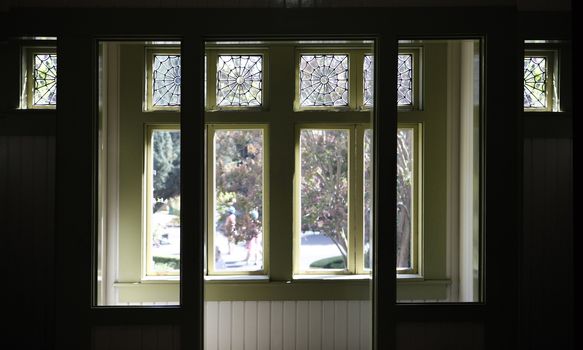 Stained-glass window the Winchester Mystery House - the house number 525 on Winchester Boulevard in San Jose, California