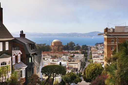 Russian consulate (right). Baker street in San Francisco. View of the bay and Palace Of Fine Arts