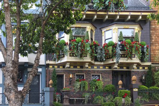Beautiful facade of the house with flowers on Castro Street in San Francisco