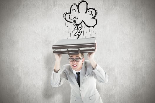 Geeky businessman holding his briefcase over head against white background