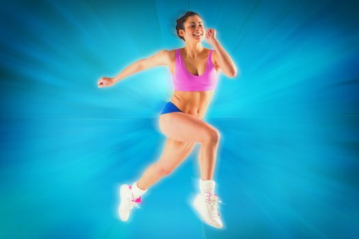 Fit brunette running and jumping against abstract background