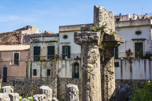 View of the ruins of the ancient greek doric temple of Apollo in Siracusa, Sicilia, Italy