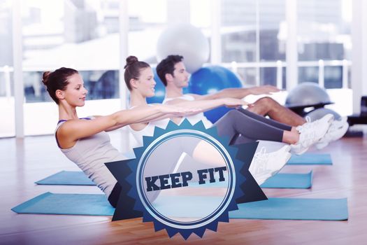 The word keep fit and class stretching on mats at yoga class against badge