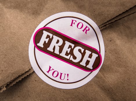 A Bag Of Pastries Or Donuts With Fresh For You Label