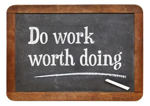 Do work worth doing - motivational words on a vintage slate blackboard