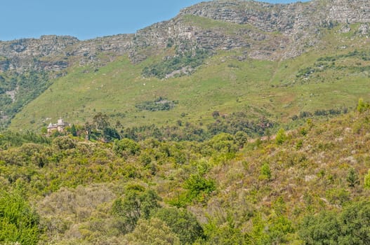 House in the style of a castle on the foothills of the Hottentots-Holland Mountains near the Jonkershoek Nature Reserve