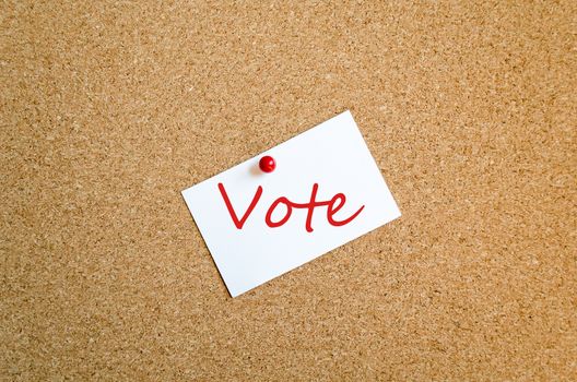 Sticky Note On Cork Board Background Vote Concept