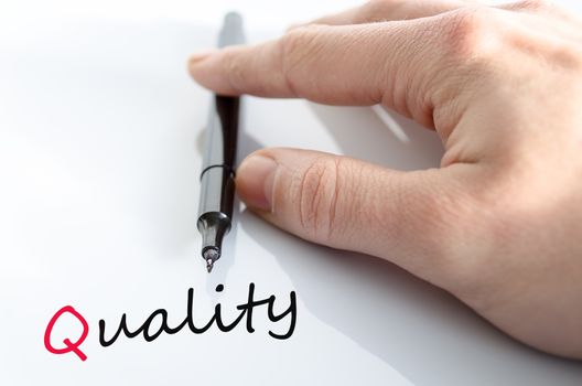 Pen in the hand isolated over white background quality concept