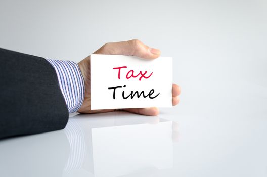 Bussines man hand writing Tax Time