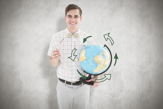 Geeky hipster holding a globe against white background